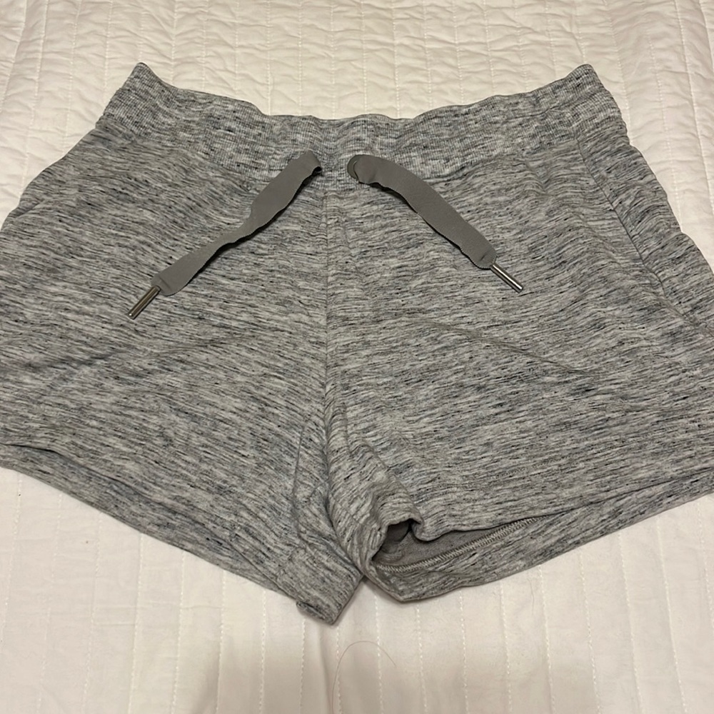 Athleta gray shorts with drawstring and pockets. Size small